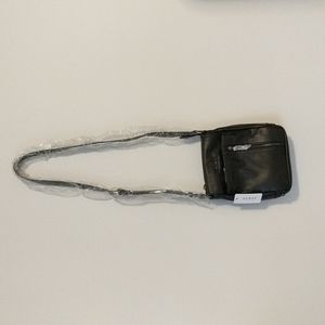 Black GUESS purse/crossbody bag with zipper compartments.